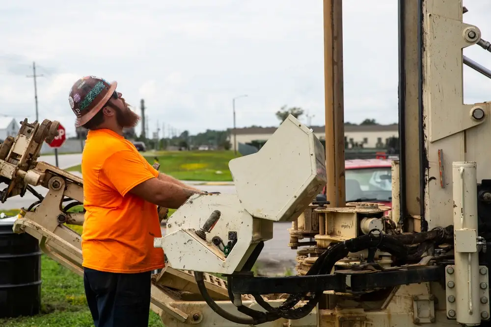 A driller operates a sonic drill to gather soil samples to be tested for Per- and Polyfluoroalkyl Substances (PFAS) on Marine Corps Base Camp Lejeune, North Carolina, Aug. 19, 2020. PFAS are man-made chemicals commonly used for clothing, food packaging and carpeting and have the potential to be toxic. Frequent testing is done to ensure drinking water on MCB Camp Lejeune and MCAS New River is safe. (U.S. Marine Corps photo by Lance Cpl. Christian Ayers)