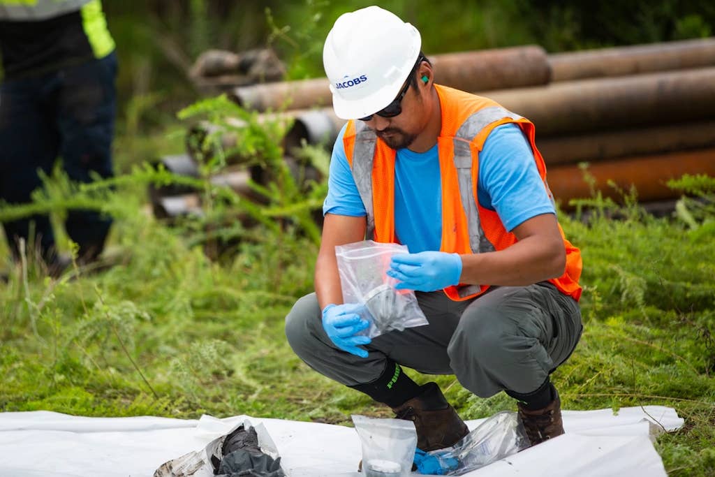 A radiological engineer gathers soil samples to be tested for Per- and Polyfluoroalkyl Substances (PFAS) on Marine Corps Base Camp Lejeune, North Carolina, Aug. 19, 2020. PFAS are man-made chemicals commonly used for clothing, food packaging and carpeting and have the potential to be toxic. Frequent testing is done to ensure drinking water on MCB Camp Lejeune and MCAS New River is safe. (U.S. Marine Corps photo by Lance Cpl. Christian Ayers)