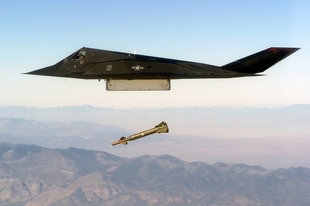 An F-117 Nighthawk engages its target and drops a GBU-27 guided bomb unit during the 'live-fire' weapons testing mission COMBAT HAMMER, at Hill Air Force Base, Utah. (DoD photo)
