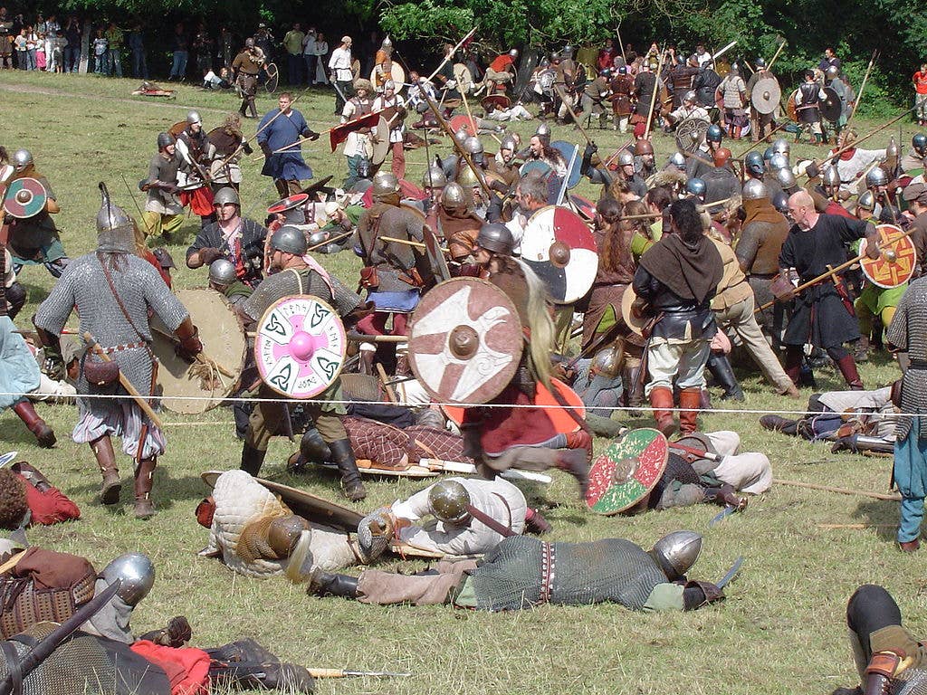 Vikings fighting (part of a festival), photo taken in August 2005 in Denmark by <a href="https://commons.wikimedia.org/wiki/User:Tone">Tone</a>.