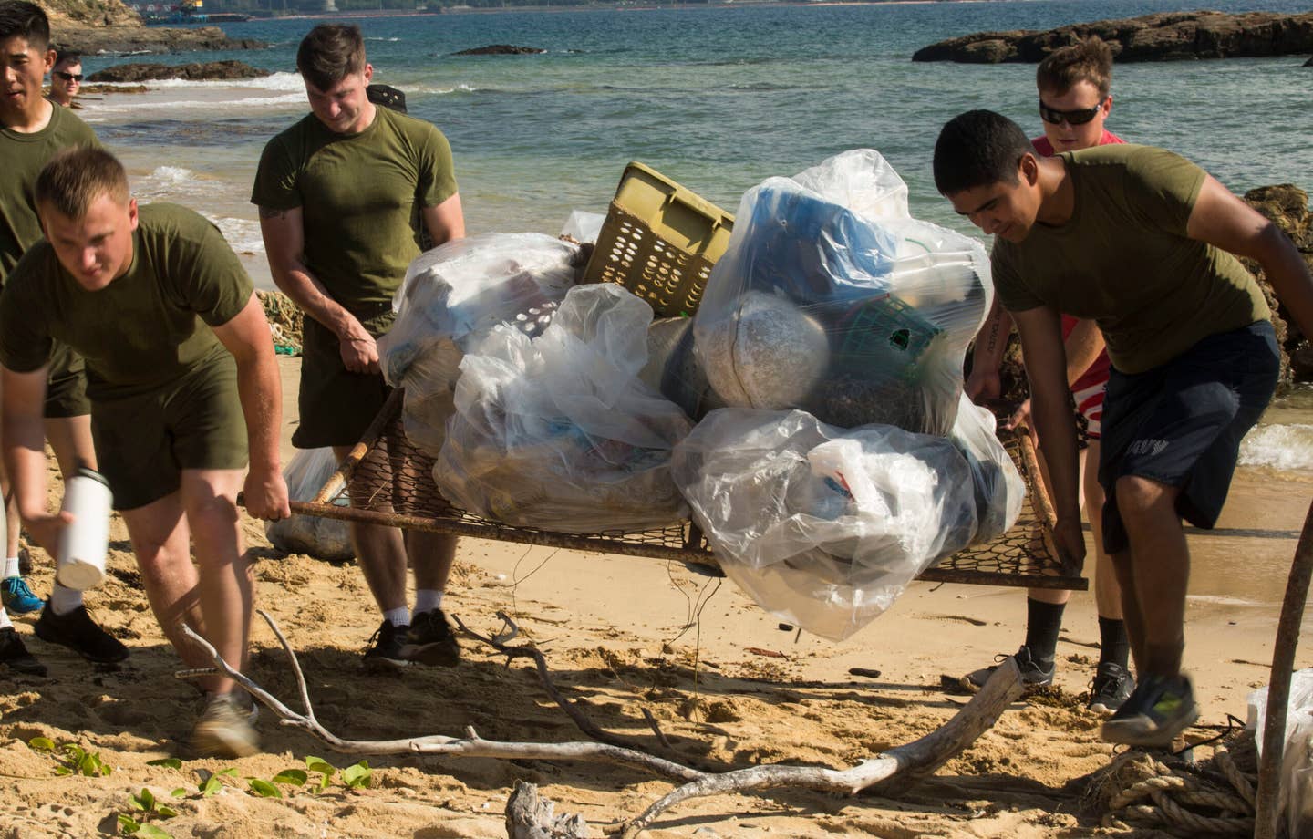 These Marines were likely bored... now they're in a working party. (U.S. Marines Corps photo by Lance Cpl. Deseree Kamm)