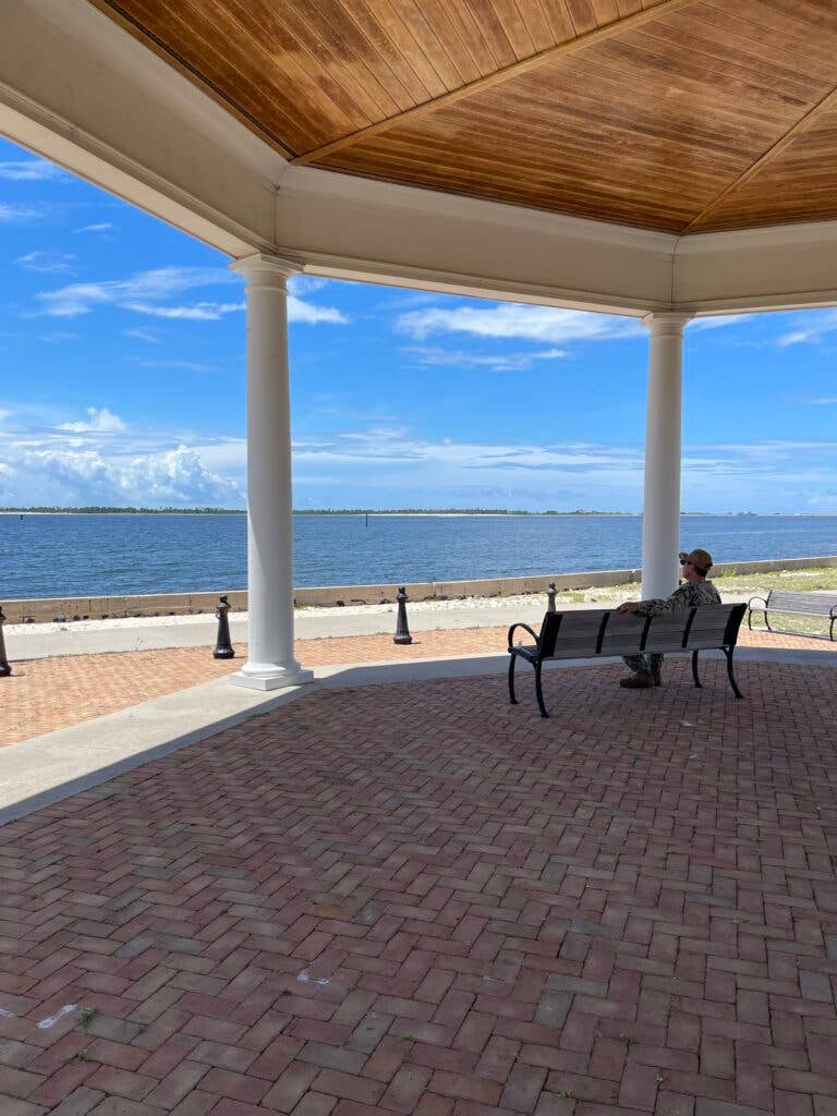 Cmdr. John Ismach-Eastman, chaplain, takes an opportunity to learn about NAS Pensacola, reflect and enjoy the view while on his lunch break.