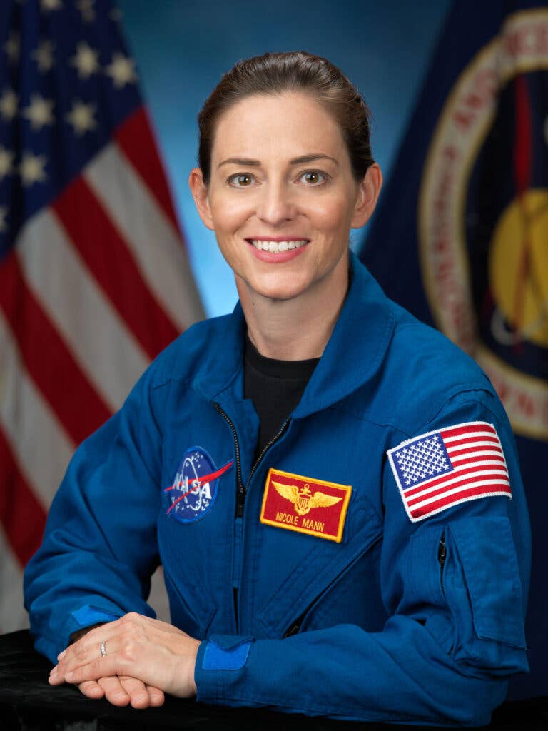 <em>Official astronaut portrait of Col. Nicole Aunapu Mann, January 13, 2014 (NASA)</em>