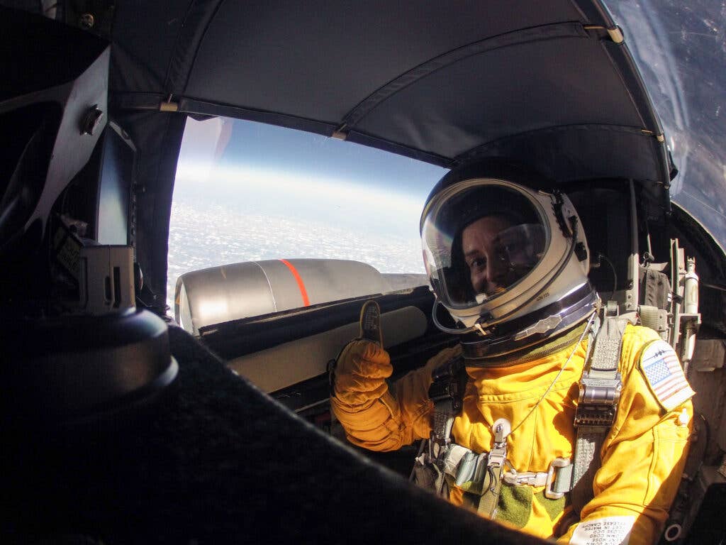 <em>Col. Mann aboard a WB-57 during a Space Readiness Training flight, July 15, 2016 (NASA)</em>