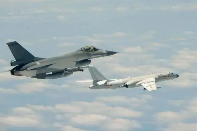 <em>A ROCAF F-16 intercepts a PLAAF H-6 bomber (ROCAF)</em>