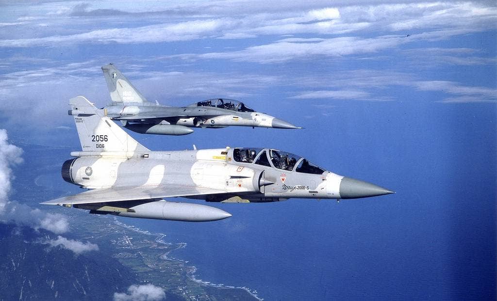 <em>A ROCAF Mirage (foreground) flies with an F-CK-1 (background) (Taiwanese Ministry of National Defense)</em>