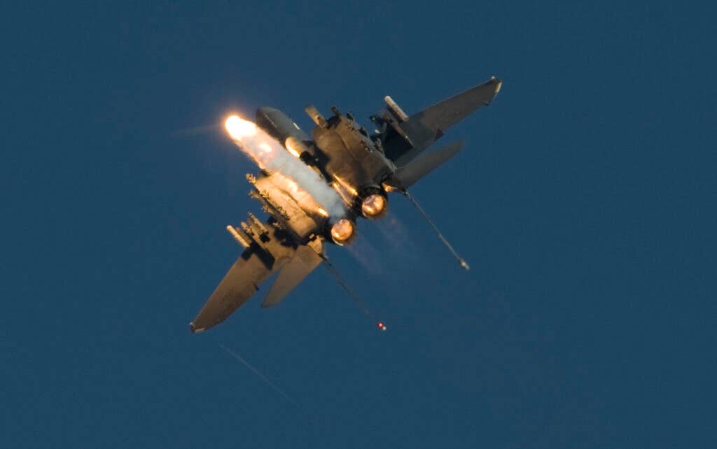 An F-15E Strike Eagle from the U.S. Air Force Weapons School deploys flares during Aviation Nation, Nov.11, 2012, at Nellis Air Force Base, Nev. (U.S. Air Force Photo By Senior Airman Daniel Hughes)