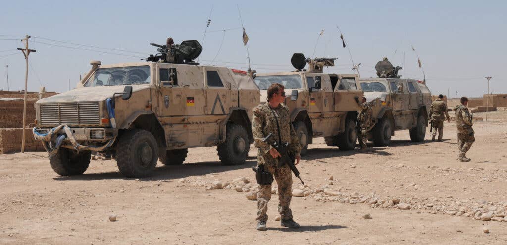 <em>German soldiers on patrol in Mazar-e-Sharif, Afghanistan with their Dingos (ISAF photo)</em>