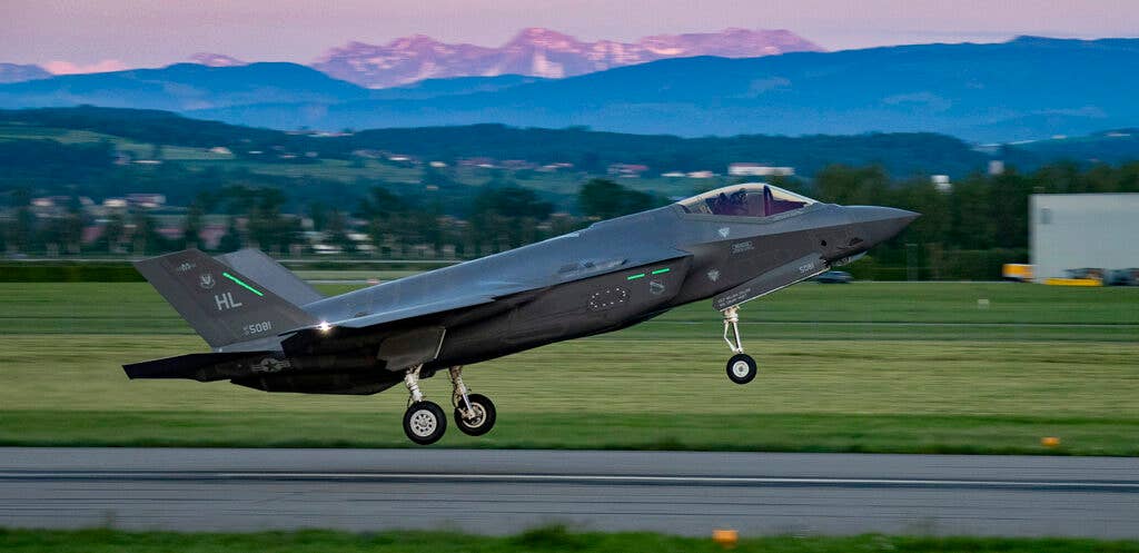 <em>An American F-35A lands at Payerne Air Base, Switzerland during a 2019 evaluation by the Swiss Air Force (Lockheed Martin)</em>