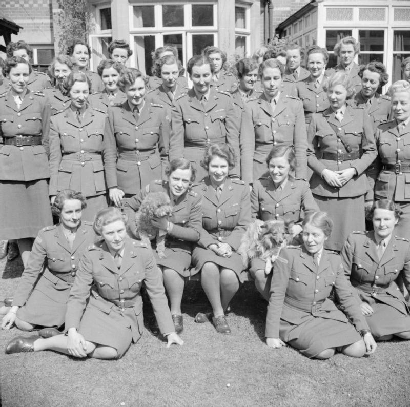 queen elizabeth ii with other officers