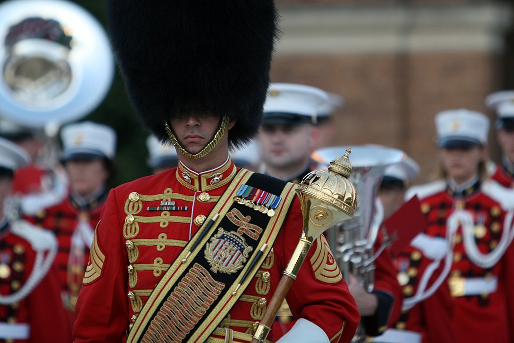 A drum major in "The President's Own" United States Marine Band prepares to report to the parade commander during a parade at Marine Barracks Washington. The President's Own performs in more than 500 ceremonies and concerts across the country annually. (U.S. Marine Corps photo by Lance Cpl. Chris Dobbs/Released)