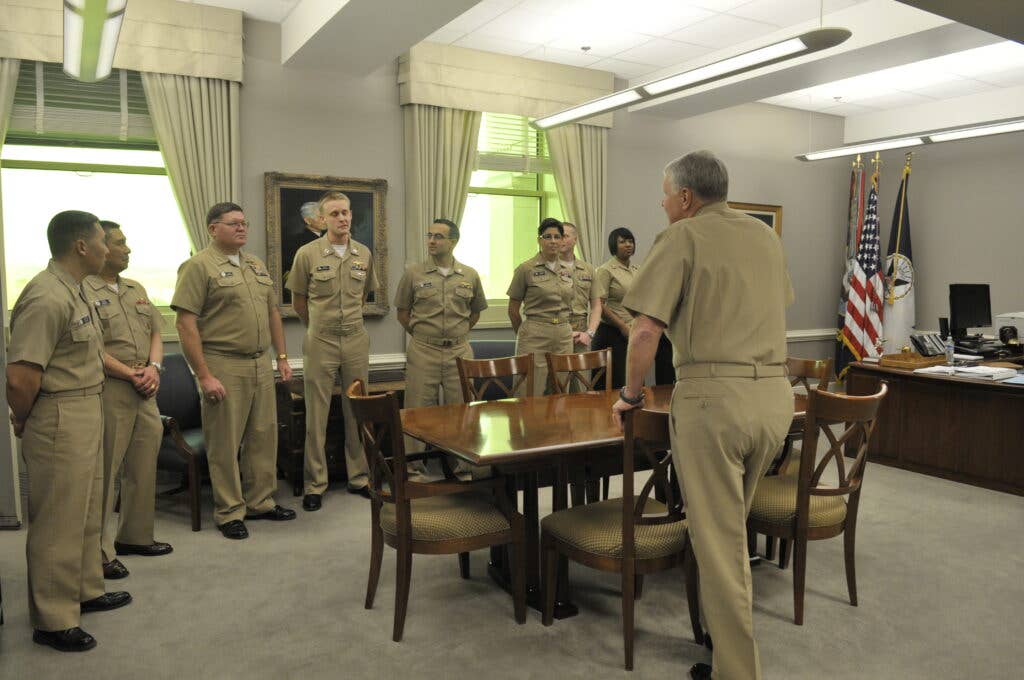 Chief of Naval Operations Adm. Gary Roughead meets with departing OPNAV staff during an office call at the Pentagon. (U.S. Navy photo by Chief Mass Communication Specialist Tiffini Jones Vanderwyst)