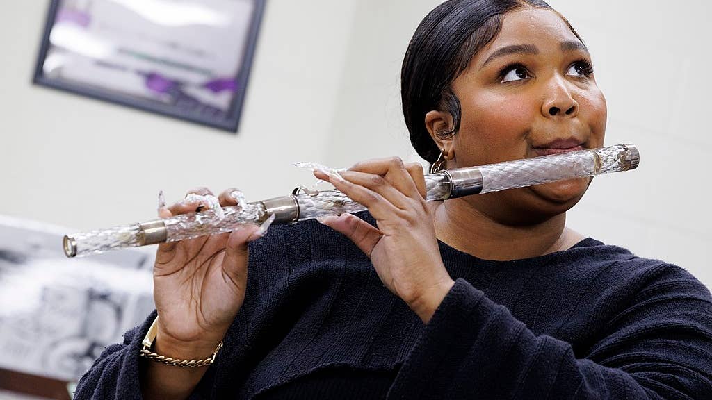 lizzo playing flute