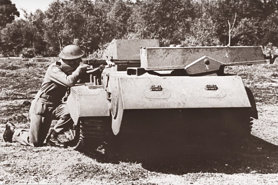 soldier behind praying mantis tank