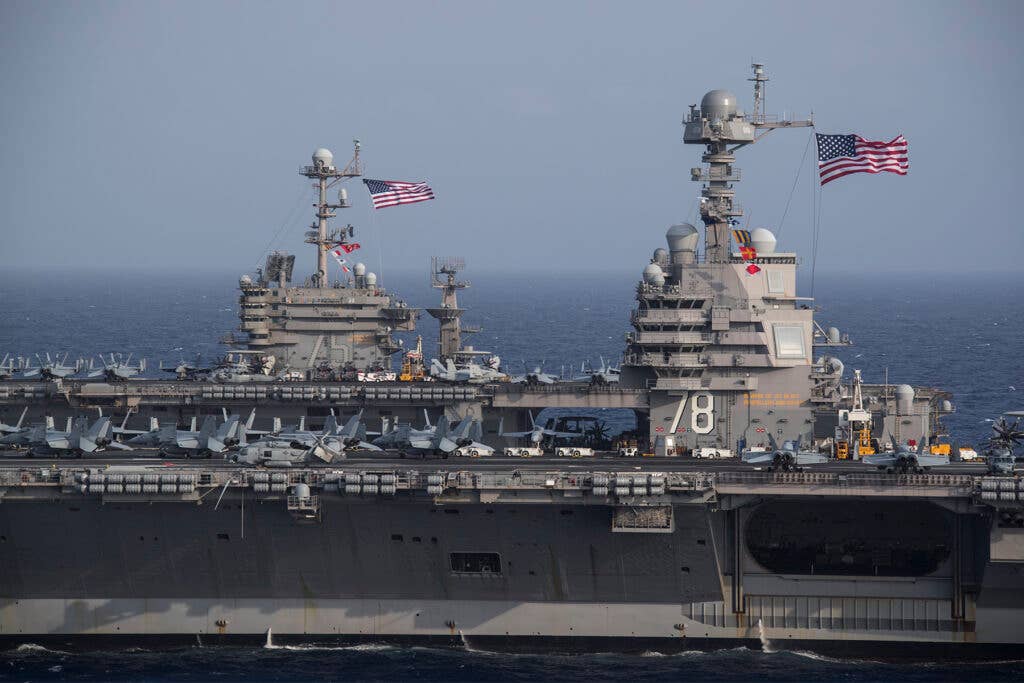 <em>The </em>Ford<em>-class aircraft carrier USS </em>Gerald R. Ford<em> (CVN-78) and the </em>Nimitz<em>-class aircraft carrier USS </em>Harry S. Truman<em> (CVN-75) transit the Atlantic Ocean, June 4, 2020, (U.S. Navy photo by Mass Communication Specialist 2nd Class Ruben Reed)</em>