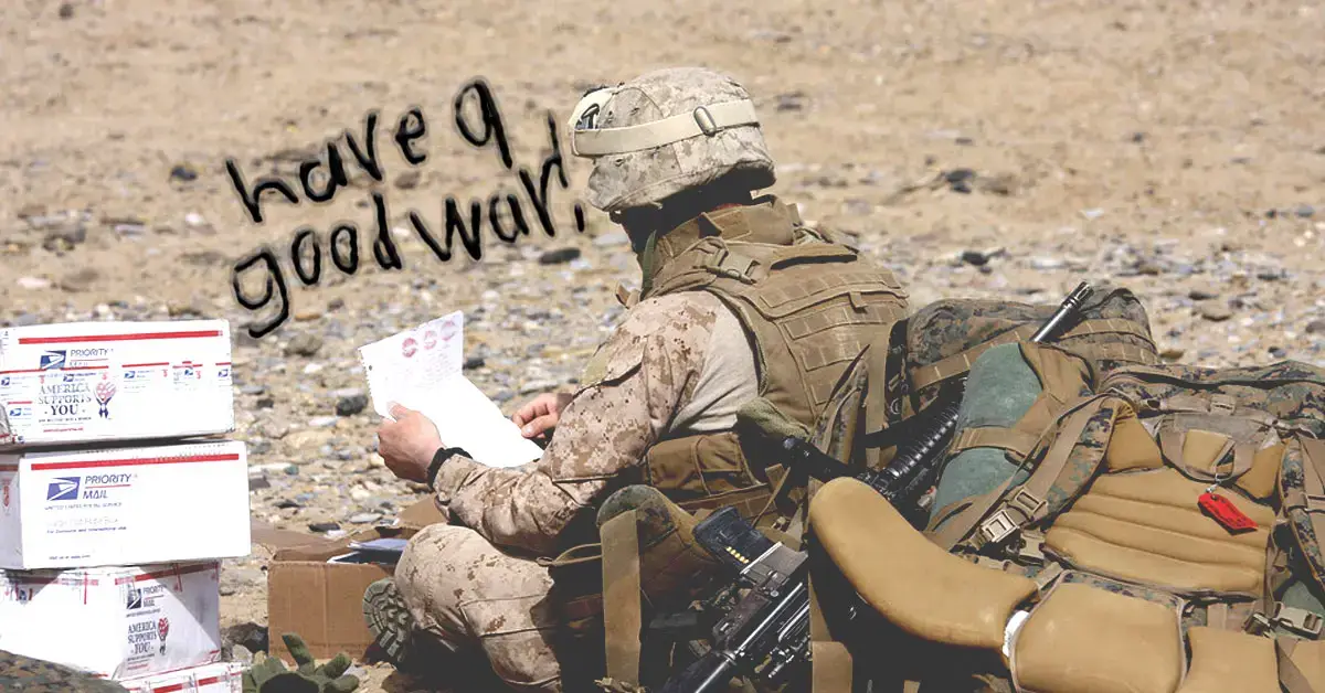 Marine reading letters kids sent to deployed troops.