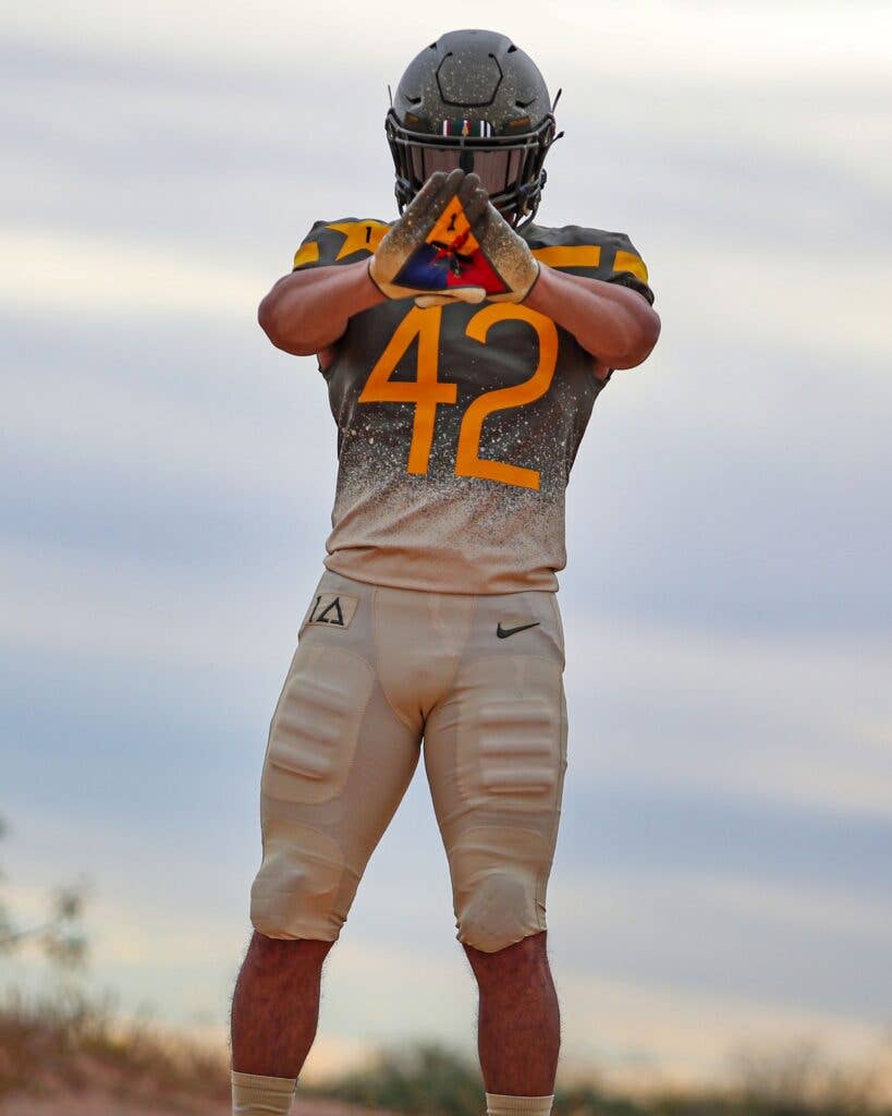 <em>Army's 2022 Army-Navy game uniform honors the 1st Armored Division "Old Ironsides" (Army West Point Athletics)</em>