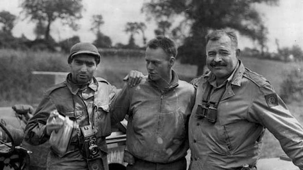 Hemingway (right) had his own objective during the liberation of Paris (Public Domain)
