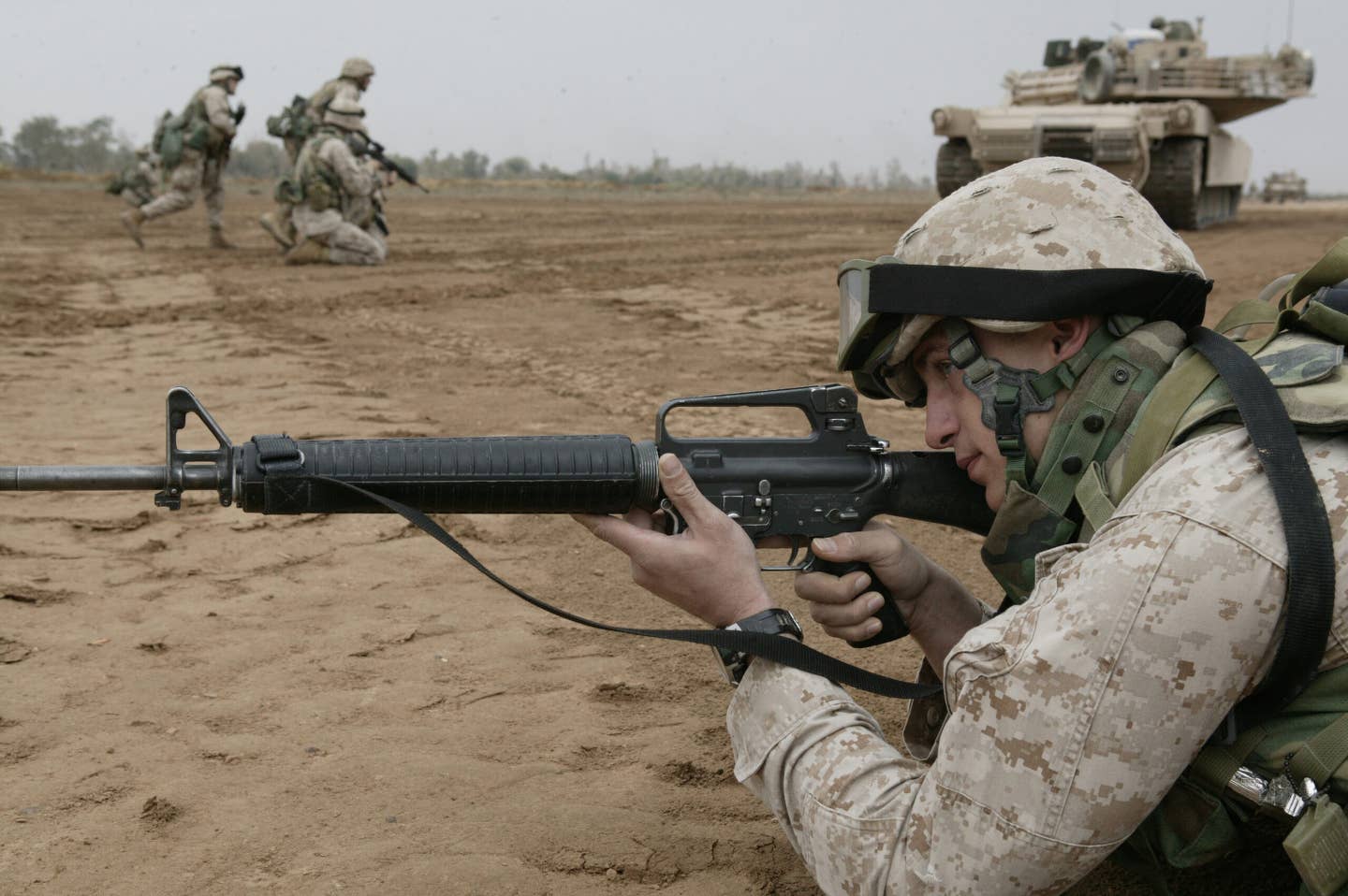 A Marine with Company I, 3rd Battalion, 5th Marine Regiment, sights in his M16A2.
