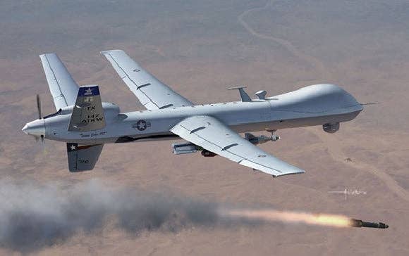 <em>An MQ-9 Reaper deploys a Hellfire missile (U.S. Air Force)</em>