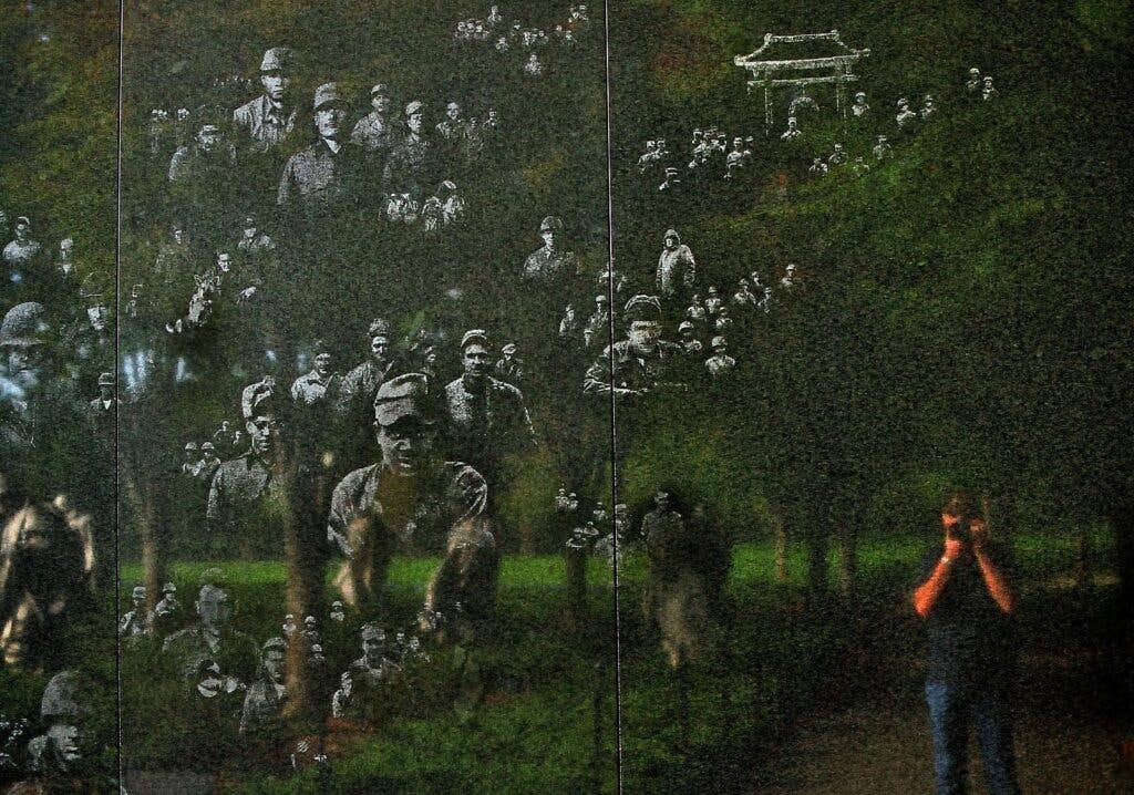 The Korean War Veterans Memorial mural wall also portrays faces of military personnel.