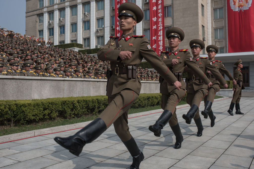 Korean People's Army (KPA) soldiers march to their positions prior to a military parade marking the 105th anniversary of the birth of late North Korean leader Kim Il-Sung, in Pyongyang on April 15, 2017.   / AFP PHOTO / ED JONES/AFP via Getty Images 