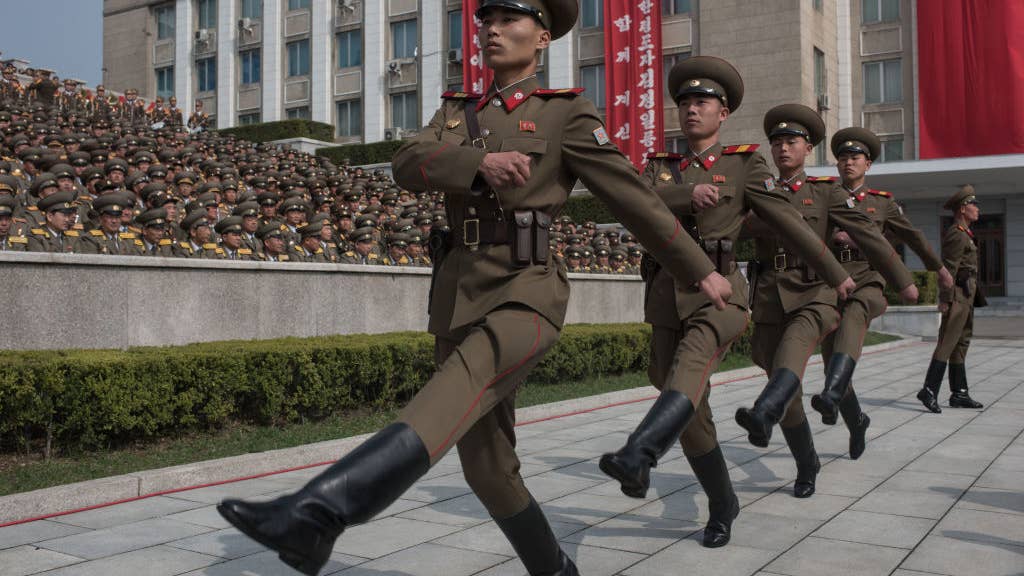 Why North Korean troops wear those ridiculous giant hats