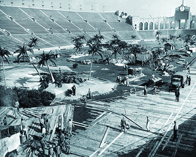 Film studios provided sets that U.S. Navy Seabees constructed on the field in the battle of the LA coliseum