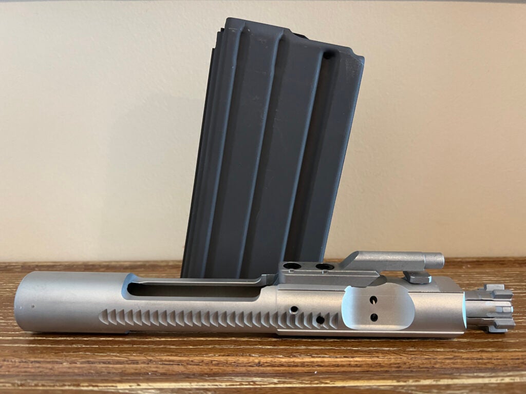 bolt carrier group and load 30-round magazines