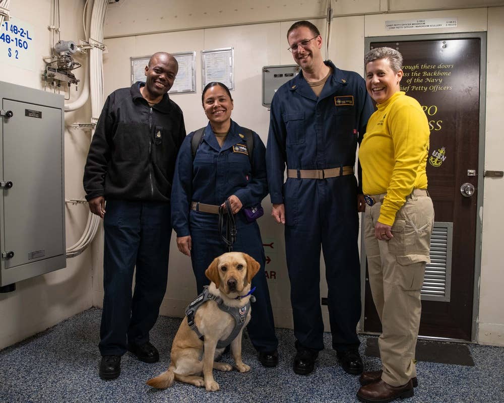 USS Ford crew and dog