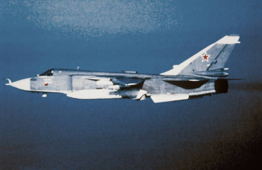 A left side view of a Soviet Su-24 Fencer light bomber in flight (National Archives)