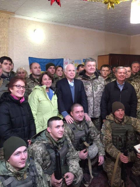 <em>McCain and a bipartisan delegation with Ukrainian Marines at a forward combat outpost, Dec. 31, 2016 (twitter.com/SenJohnMcCain)</em>