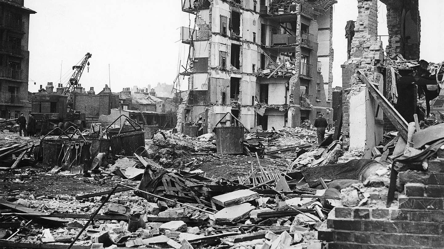 Ruined flats in Limehouse, East London. Hughes Mansions, Vallance Road, following the explosion of the last German V2 rocket to fall on London, 27 March 1945.
