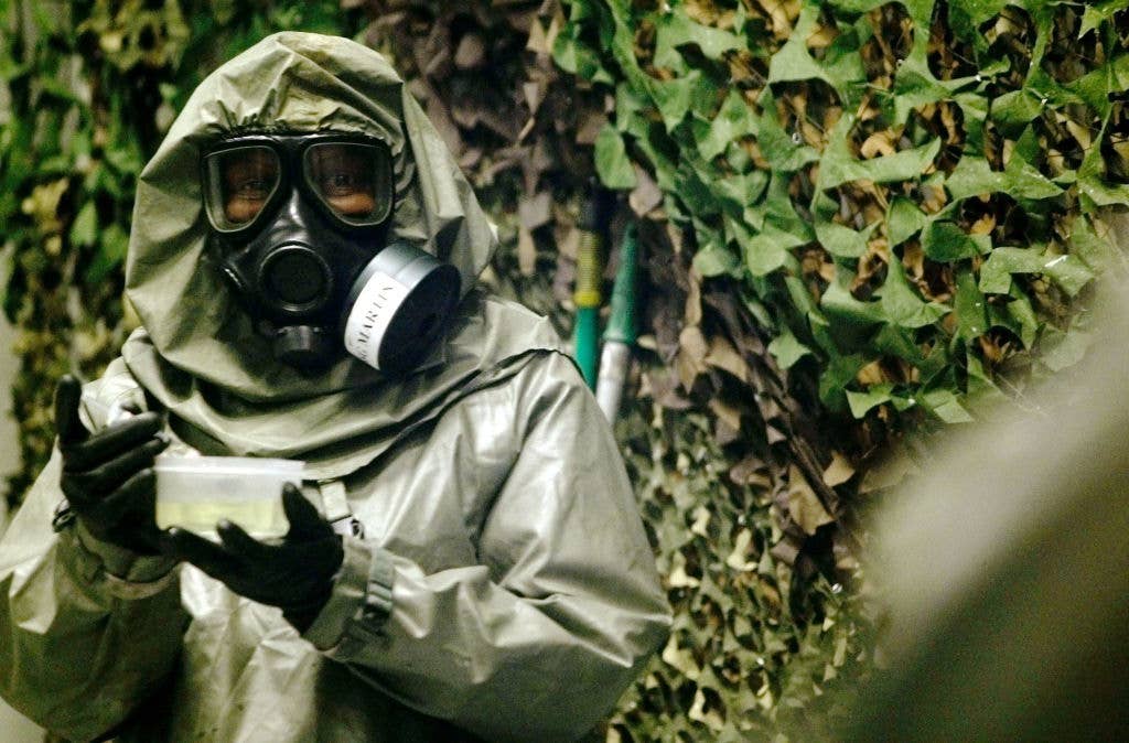 Man in suit to protect from deadliest chemical weapons