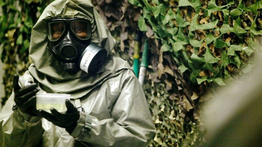 Man in suit to protect from deadliest chemical weapons