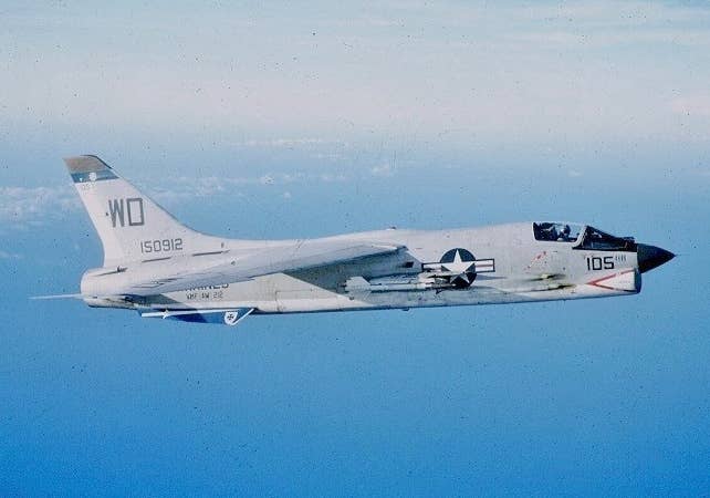 An F-8E from VMF(AW)-212 in 1965 .