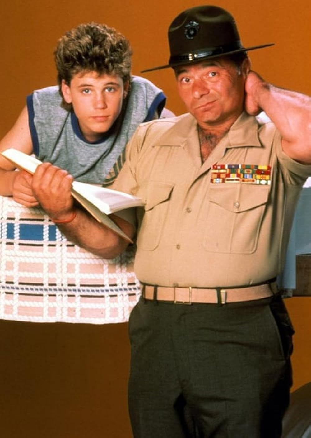 Burt Young in the TV series Roomies with Corey Haim.
