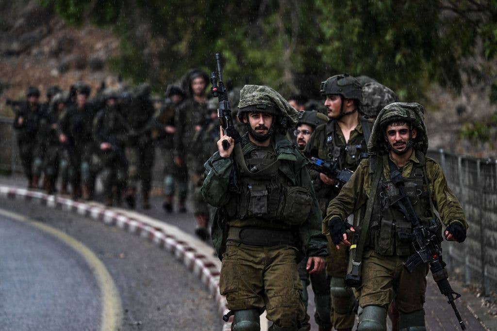 Israeli army soldiers patrol an undisclosed area in northern Israel bordering Lebanon.