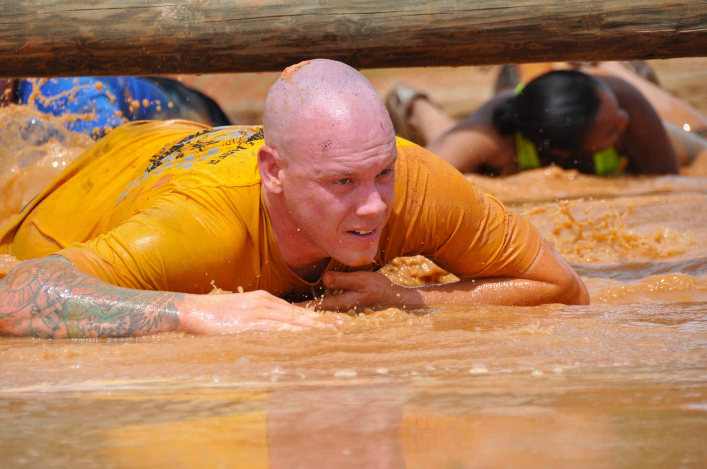 Sailor competes in the 6th annual Marine Mud Challenge at Fort Gordon.