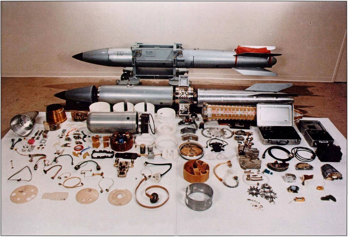 An assembled (background) and disassembled (foreground) B61.