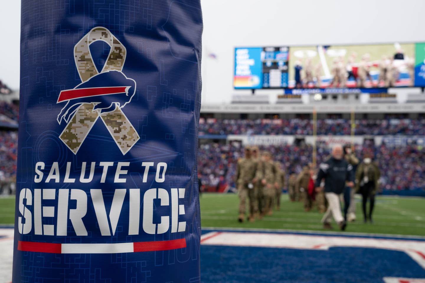 NFL Salute to Service logo on football goal post.