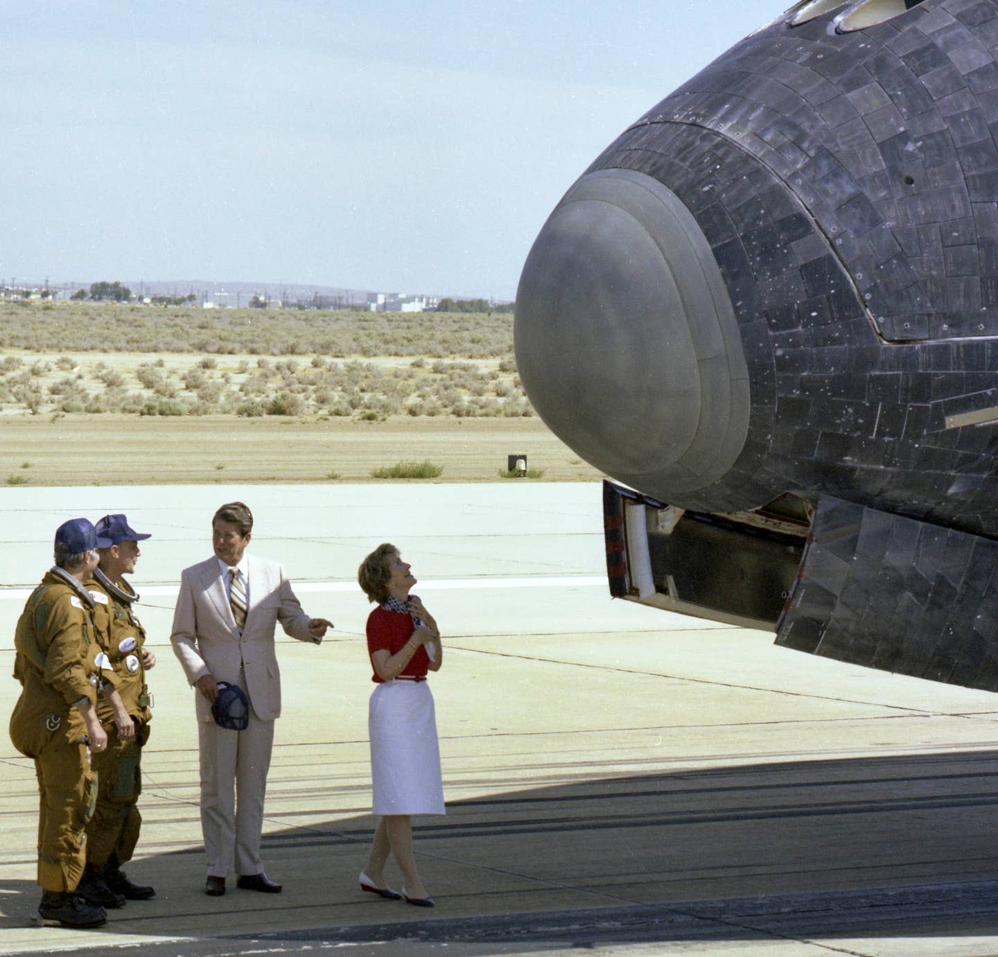 President and Mrs. Reagan chat with Mattingly and Hartsfield, both Auburn grads, after their return to Earth.
