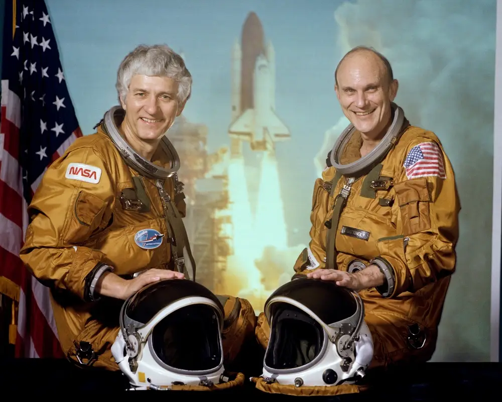Hartsfield and ken mattingly in space suits.