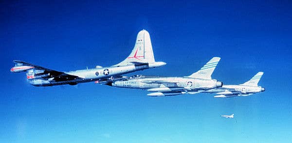 A KB-50J refuels a pair of F-105s.