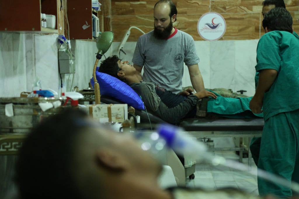 Syrians receive medical treatment after Assad regime's alleged chemical gas attack.