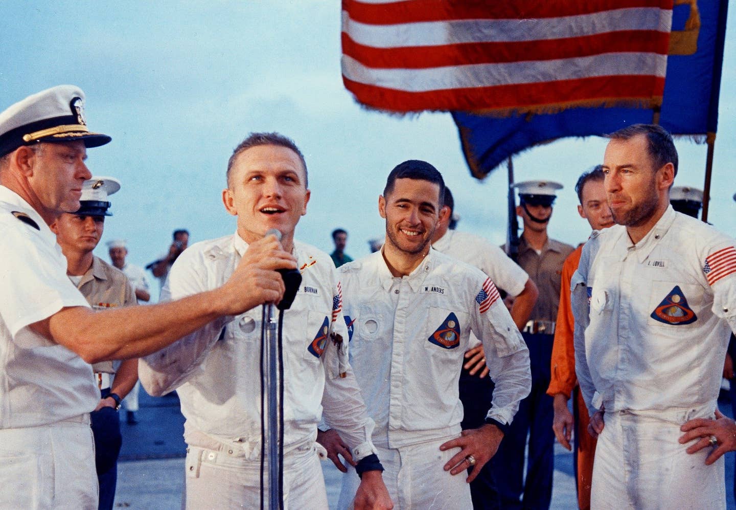 <em>Borman addresses the crew of the USS </em>Yorktown<em> after the recovery of Apollo 8 (NASA)</em>
