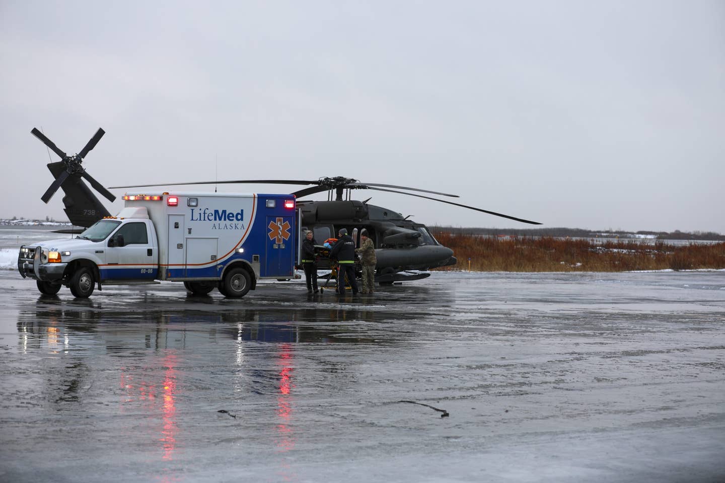 <em>The patient is transferred to the LifeMed ambulance (Alaska National Guard)</em>