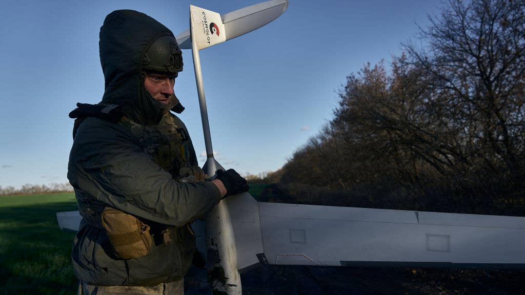 VUHLEDAR, UKRAINE - NOVEMBER 7: Ukrainian military operate a Punisher drone, a small fixed-wing reusable aircraft used by frontline infantry to strike military targets, on November 7, 2023 near Vuhledar, Ukraine. (Photo by Kostya Liberov/ Libkos via Getty Images)