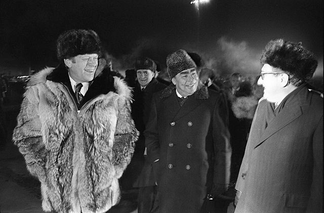 Photograph of President Gerald Ford, Secretary Leonid Brezhnev, and Henry Kissinger at the Conclusion of the Vladivostok Summit&nbsp;