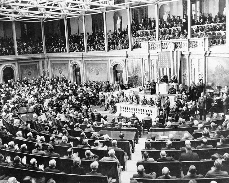 <em>FDR addresses Congress after Pearl Harbor (National Archives)</em>